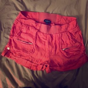 Bebe tight shorts with baggy type material.